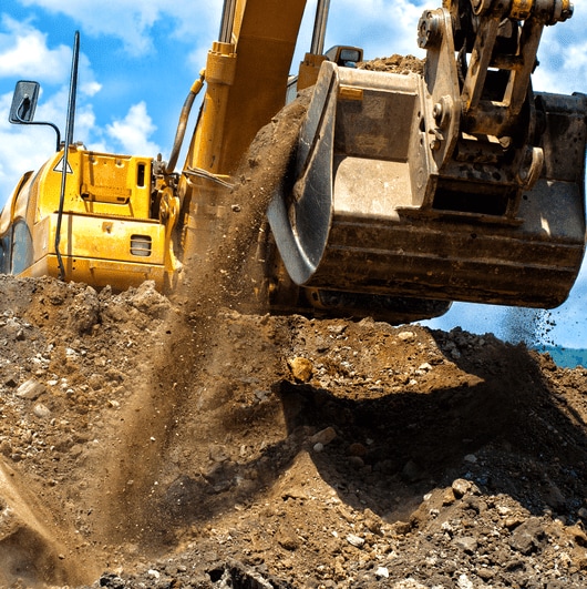 Progressive lubrication systems for construction machines